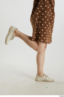 Aera  1 brown dots dress casual dressed flexing leg…